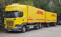 =Scania R 440-Hängerzug von DHL rastet an der A 7 im Augst 2019
