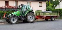 =Deutz-Fahr Agrotron 6.01 S steht zur Entladung in Hünfeld, Juli 2019