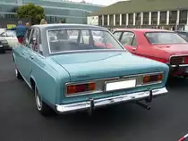 Heckansicht einer viertürigen Ford Taunus P7a Limousine. Alt-Ford-Treffen an Mo´s Bikertreff in Krefeld am 01.09.2019.