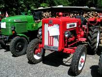 IHC-Cormik,41PS,Bj.1962 ist neben einem Steyr180 platziert; Oldtimerausstellung in Lohnsburg; 080622