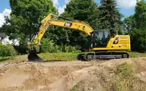 =Cat 320 steht auf einer Baustelle in Petersberg-Marbach im Juli 2019