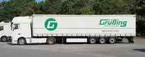 =DAF XF von OLTIMEX mit einem Sattelauflieger der Spedition GRÜßING rastet im August 2018 an der A 7