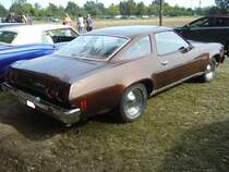 Profilansicht eines Chevrolet Chevelle Malibu Coupe im Farbton medium bronce aus dem Jahr 1973. Oldtimertreffen des Oldtimerclubs Schermbeck am 22.09.2019 in Lühlerheim.