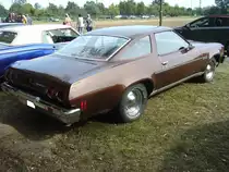Profilansicht eines Chevrolet Chevelle Malibu Coupe im Farbton medium bronce aus dem Jahr 1973. Oldtimertreffen des Oldtimerclubs Schermbeck am 22.09.2019 in Lühlerheim.