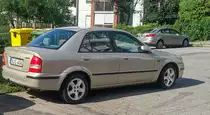 Mazda 323 Sedan, aufgenommen in August, 2019. Standort: Pécs, HU.