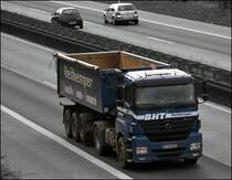 ... und ein weiterer AXOR 1843 von HEITKEMPER sind gemeinsam vermutlich nach Hohenlimburg unterwegs, um dort neue Ladung aufzunehmen. (13.03.2009)
