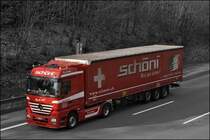 YES WE CAN! Actros MP2 (vermutl. 1846) der schweizer SCH�NI TRANSPORT AG. (17.03.2009)
