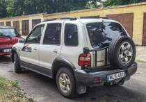 Kia Sportage der ersten generation (Rückansicht), fotografiert in Pécs (HU), August, 2019.