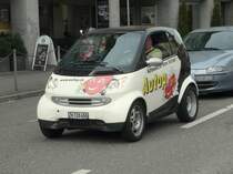 Smart - Smart ZH 728486 mit Werbung unterwegs in der Stadt Z�rich am 14.03.2009