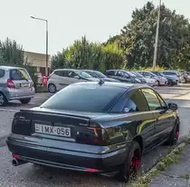Opel Calibra, fotografiert in Pécs (Ungarn) in August 2019.