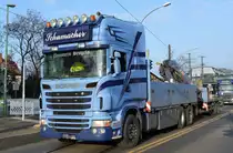 Ein sehr schöner SCANIA R? LKW mit Seiten- und Heckborden als Selbstlader mit Hydraulikgreifarm am Heck + Häger der Fa. Schumacher für Baustoffe u.a. am 13.12.19 Berlin Karlshorst. 
