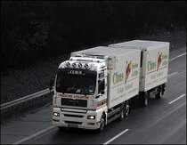 MAN TGA 26.430 der CLAUS Frisches Gefl�gel - Gefl�gelgro�handel ist in Richtung Norden unterwegs. (24.03.2009)
