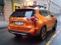 Nissan X-Trail in orange, fotografiert in Oktober, 2019.