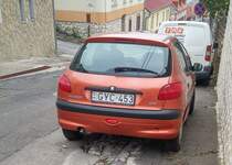 Rückansicht: Peugeot 206 in orange, fotografiert in Oktober, 2019.