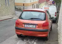 Rückansicht: Peugeot 206 in orange, fotografiert in Oktober, 2019.