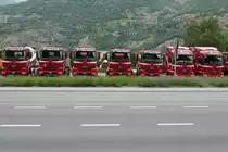 Diverse MB Arocs von Volken Beton und Actros der Volken Group die am 23.7.16 in Visp parkiert sind.