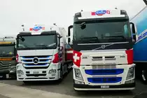 Volvo FH und MB Actros Sattelschlepper von Emmi am 26.6.16 beim Trucker Festival Interlaken.