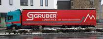 =Scania-Sattelzug von GRUBER-Logistics rollt im Dezember 2020 durch Fulda