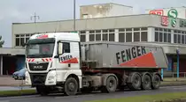 Fenger Beton und Kies GmbH & Co KG (Fenger-Gruppe) mit einem MAN Sattelkipper am 16.12.20 Schönefeld b. Berlin.