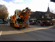 Kranwagen Spiering SK 498-AT 4  BE  3627 unterwegs in Münchenbuchsee am 18.12.2020