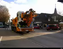 Kranwagen Spiering SK 498-AT 4  BE  3627 unterwegs in Münchenbuchsee am 18.12.2020