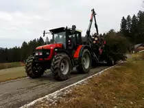 SAME samt Rückewagen, beim Abtransport von Fichtengeäst; 191230