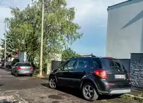 Rückansicht: Suzuki SX4 aus ca 2006, fotografiert in Juli 2020.