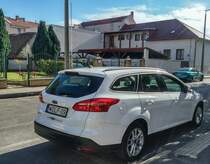 Ford Focus Mk3 Turnier, Firmenwagen von Wolf Klimatechnik, gesehen in August 2020.