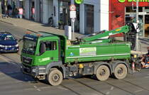 Fa. Korkmaz Garten- und Landschaftsbau GmbH aus Berlin mit einem MAN TGS 29.450 Baukipper (Selbstlader) am 10.03.21 Berlin Adlershof.