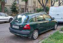 Rückansicht: grüner Honda Civic Mk7 in September, 2020.