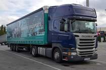 =Scania R 450-Sattelzug mit einem Auflieger der Firma KUHMICHEL, 10-2019