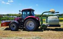 =Case 110 vom Lohnunternehmen KERN mit Krone-Ballenwickler, 05-2021