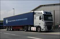 DAF XF105.510SCC  SuperSpaceCab  zieht eine Planensattel mit der Aufschrift BPW BERGISCHE ACHSEN. (15.04.2009)
