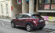 Nissan Juke Mk2 in der Farbe  Burgundy  in Oktober 2020.