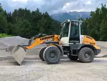 Ein werksneuer Liebherr L509 Speeder beim Salvesenbach Rückhaltebecken in Tarrenz (Tirol). Aufgenommen am 22.07.2021