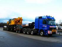 Mercedes-Benz Actros 4160 von Hegmann Transit beladen mit einem Sennebogen 683