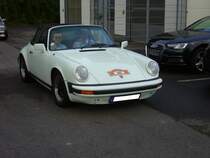 Porsche 911SC Targa von 1979. Der im Heck verbaute, gebläsegekühlte Sechszylinderboxermotor hat einen Hubraum von 2994 cm³ und leistet 180 PS. Start zum 8. Saarner Oldtimer Cup am 22.08.2021.