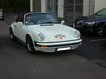 Porsche 911SC Targa von 1979. Der im Heck verbaute, gebläsegekühlte Sechszylinderboxermotor hat einen Hubraum von 2994 cm³ und leistet 180 PS. Start zum 8. Saarner Oldtimer Cup am 22.08.2021.