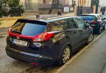 Rückansicht: Honda Civic Tourer aus der 9. Generation, gesehen in März 2021.