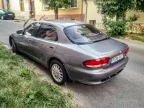 Rückansicht: Mazda Xedos 6 mit dem 2.0 V6 Motor, gesehen in Aug. 2021.