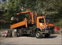 Der restliche Schotter wird auf dem Platz der AM L�denscheid in eine der Boxen abgekippt. Bevor abgekippt werden kann muss die Mulde  zur�ckgeschoben  werden, anschlie�end kann die Mulde gehoben werden. Hier einige Aufnahmen....