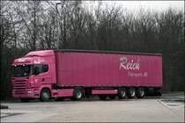 Eine weitere Aufnahme �lteren Dartums (12.03.2009) zeigt einen Scania R500 \8/ der REICH Transport AG auf dem Rastplatz Sauerland-West. 
