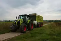 LU Norbert Mäser Claas Axion 860 mit Claas Cargos 9500 am 31.10.21 bei der Maisernte in der Wetterau