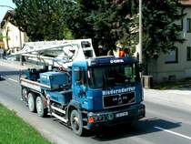 MAN-Commander, Beton-Pumpenwagen am Weg zur Firmenzentrale; 090424