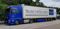 =MAN TGX von TRANS UNITED IMPEX steht auf der Rastanlage Bruchsal, 08-2021