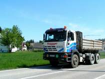 STEYR-Kipper hat soeben eine Fuhre Schotter bei einer Baustelle abgeladen; 090425