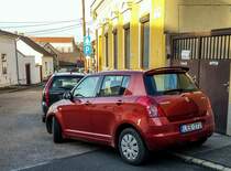 Rückansicht: Suzuki Swift Mk3 in der Farbe Sunlight Copper, gesehen in 12.2020.