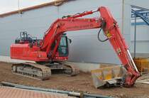 =Hydraulikbagger der ROLFES-Gruppe steht auf einer Baustelle in Künzell, 11-2021