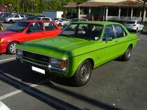 Ford Granada MK1 2.3l, gebaut in den Jahren von 1972 bis 1977. Der  Granada  und das Schwestermodell  Consul  wurden auf den Genfer Salon des Jahres 1972 vorgestellt. Sie waren das Nachfolgermodell der Baureihe P7b. Produziert wurde das Modell in Köln-Niehl und in Dagenham/GB. Der abgelichtete, viertürige, Granada trägt eine Lackierung mit der Farbbezeichnung signalgrün. Motorisiert ist dieser Granada mit einem V6-Motor , der aus einem Hubraum von 2293 cm³ Hubraum 108 PS leistet. Ein solcher Granada kostete ab März 1975 mindestens DM 18.225,00. Oldtimertreffen Café del Sol Gelsenkirchen am 18.04.2022.