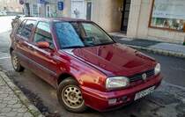 VW Golf III in der Farbe Hot Chili Red (Chilirot), gesehen in Januar 2021.